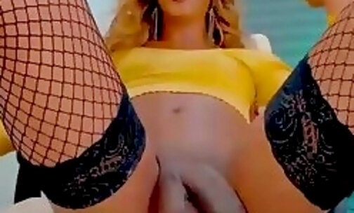slim latina transgirl in fishnet stockings tugs her huge dick on webcam