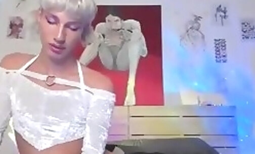 skinny Tgirl in white stockings tugs her big tool on webcam