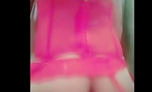 Sissy in pink chastity fucked by big dildo