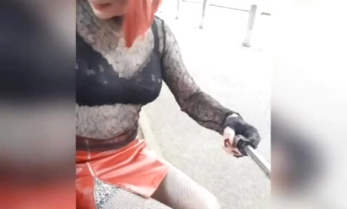 sissy showing off on a public bench