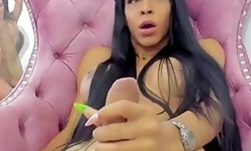 black long hair trans slut with big tits tugs her big thick cock on webcam