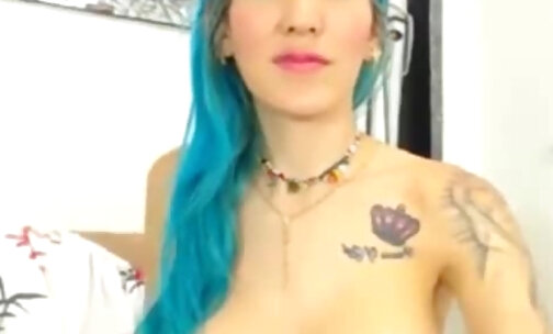 Blue Haired shemalel with Tattoos masturtbates on webcam
