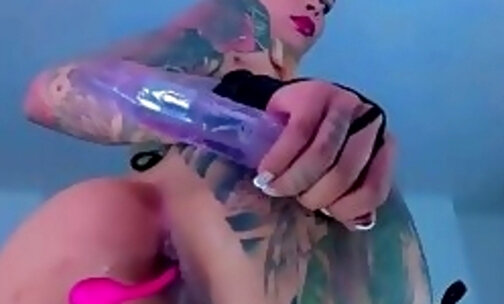 pretty latina tgirl with full tattoos toys ass on webcam