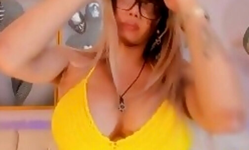 Gorgeous shemale in a yellow bra