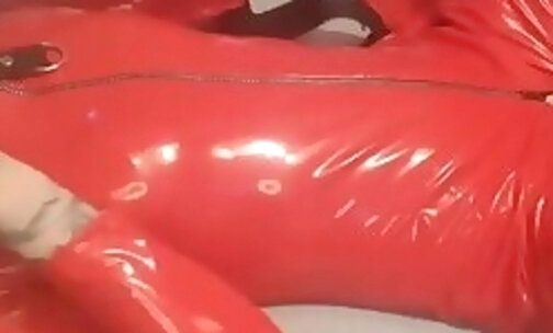 Sissy in red pvc cat suit used by rubber suited Dom xh5