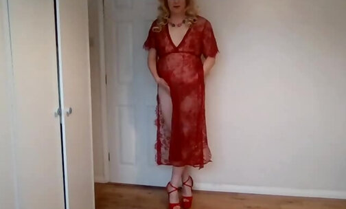 Blonde in red see-through nightdress
