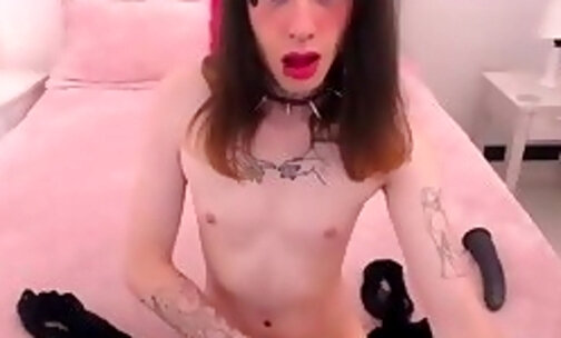 skinny brunette transgirl with some tattoos plays with her dick and ass
