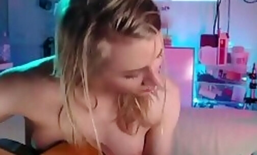 small boobs blonde tgirl loves playing the guitar on webcam