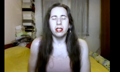 Shemale Chiara Galli cums while watching lesbian videos on webcam