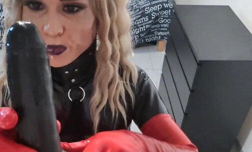 Sexy skinny Latex Vamp Girl makes video call with a friend