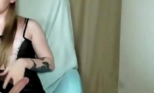 Thin swedish brunette transgirl with tattoos strokes her nice cock