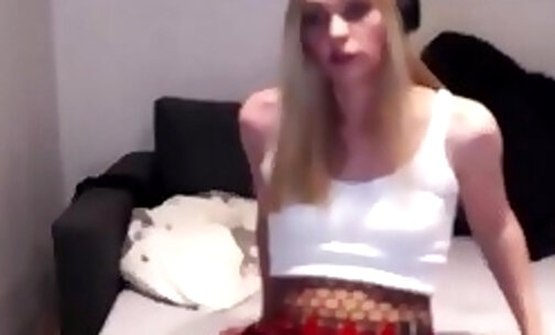 slim european blonde tgirl in fishnet pantyhose shows off her sexy feet legs on webcam