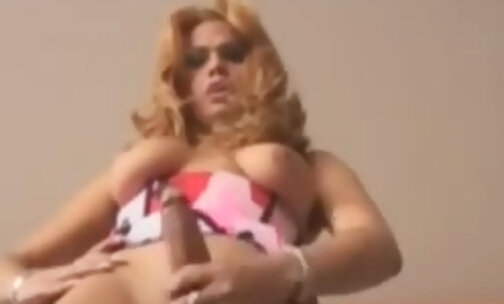 Busty blonde tranny cock jerking