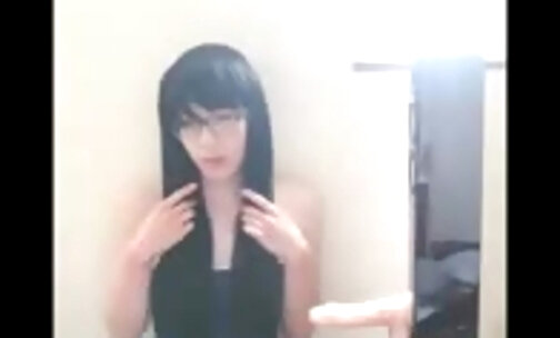 Cute Asian crossdresser cums on rubber cock